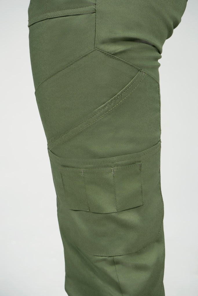 Women's 14-Pocket Cargo Scrub Jogger in shade olive cargo pocket close up view with additional utility pockets