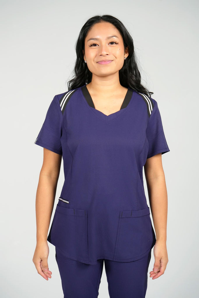 Women's Active Striped Scrub Top in navy front view on model