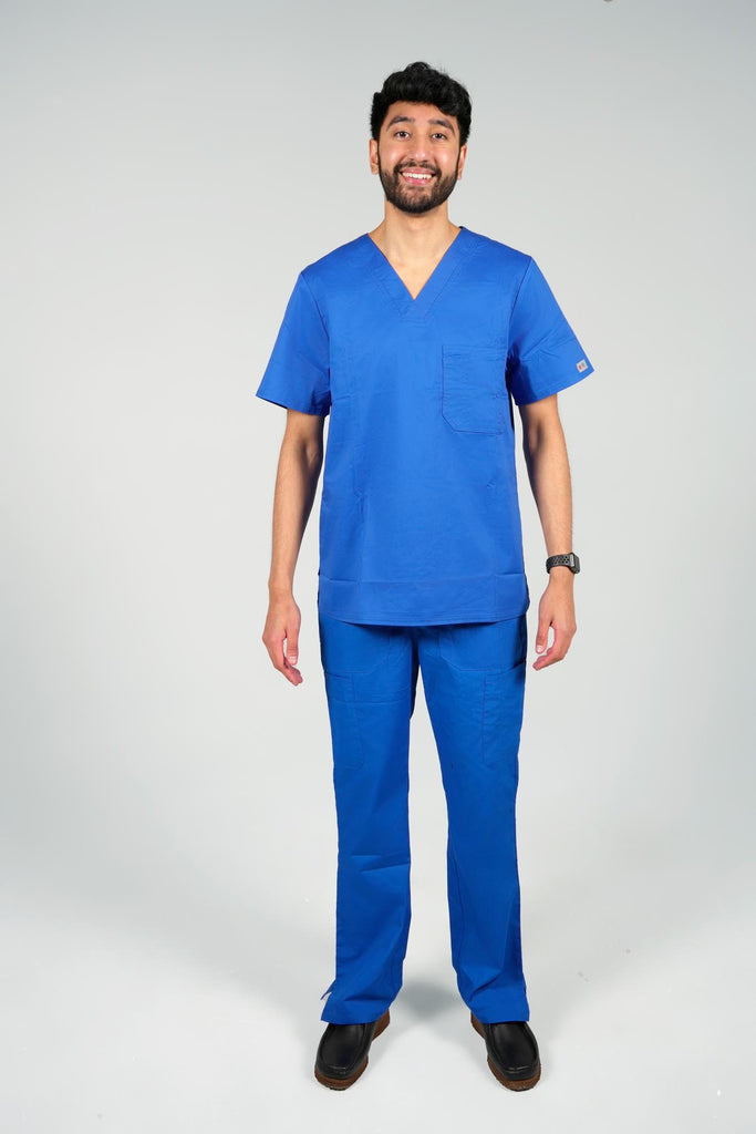 Men's 2-Pocket V-Neck Scrub Top in Royal Blue front view on model wearing matching royal blue scrub pants