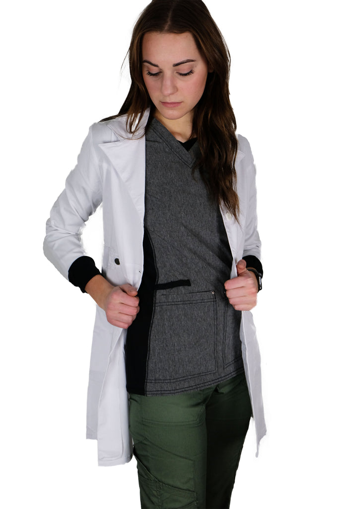 White Lab Coat Mid Length front view on model wearing charcoal and olive scrubs