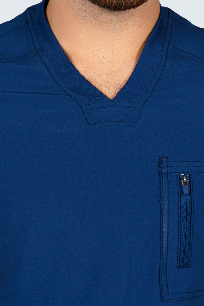 Men's Performance Zip Scrub Top in Navy closeup on neckline