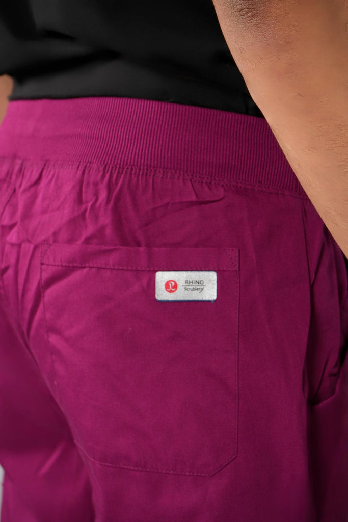 Men's 6-Pocket Elastic Scrub Pant in Wine closeup on back pocket and waistband
