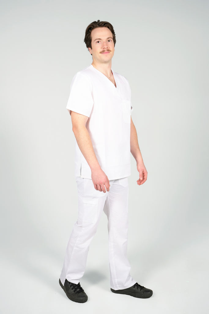 Men’s 2-Pocket V-Neck Scrub Top in White side view on model wearing white scrub pants