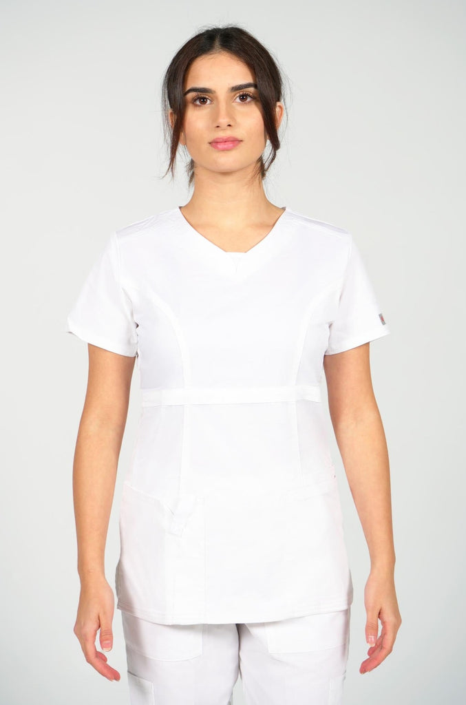 woman wearing white curved v-neck scrub top from rhino workwear