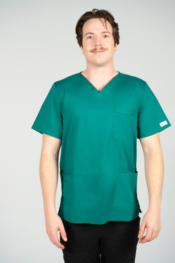 Men's 4-Pocket Scrub Top in Forest Green front view on model