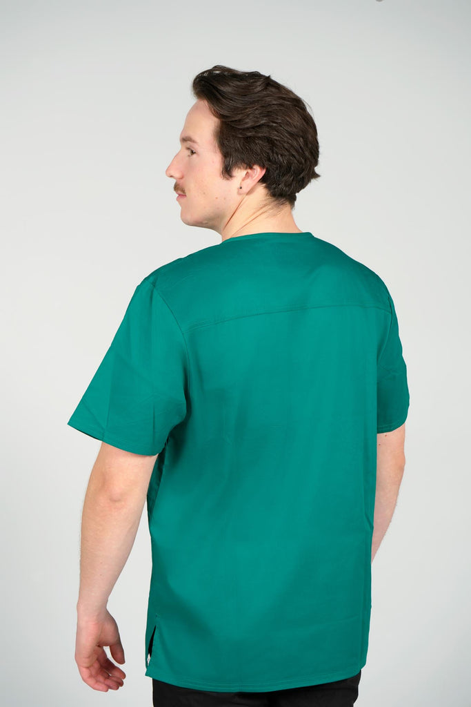 Men's 2-Pocket V-Neck Scrub Top in Forest Green back view on model