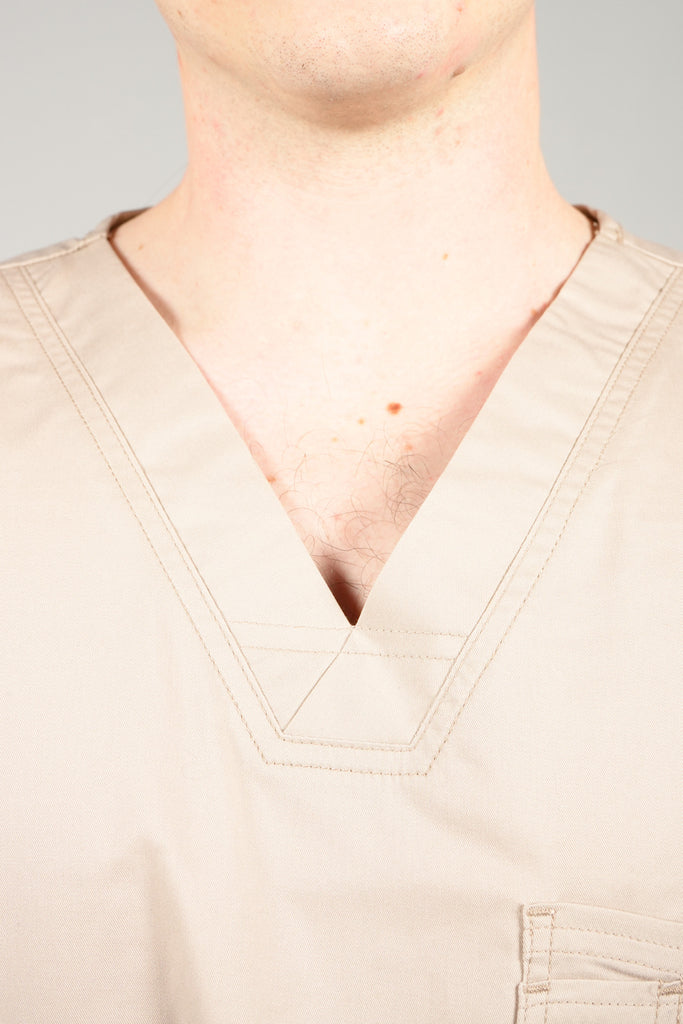 Men’s 2-Pocket V-Neck Scrub Top in Beige closeup on neckline