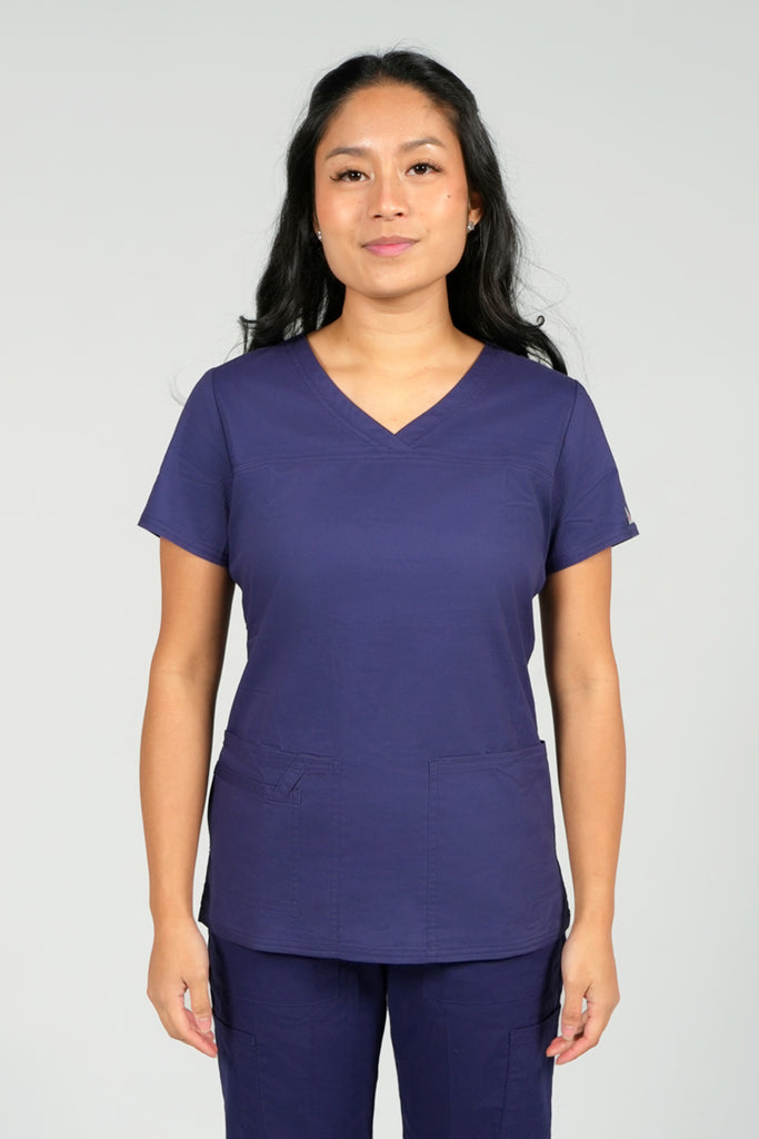 Women's Tailored 4-Pocket V-Neck Scrub Top in Navy front view on model