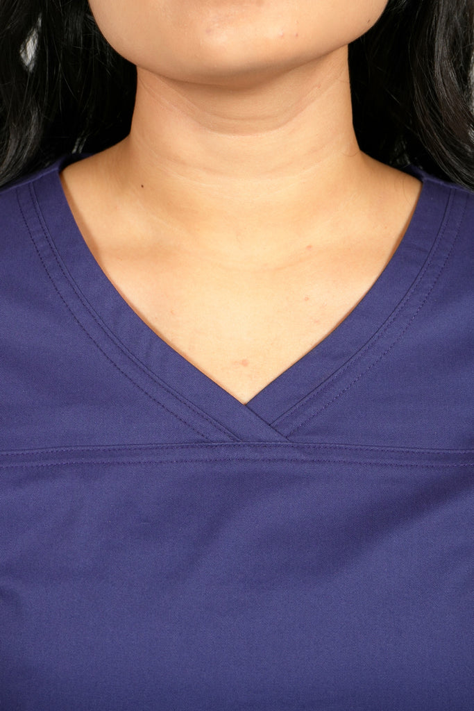 Women's Tailored 4-Pocket V-Neck Scrub Top in Navy closeup on neckline