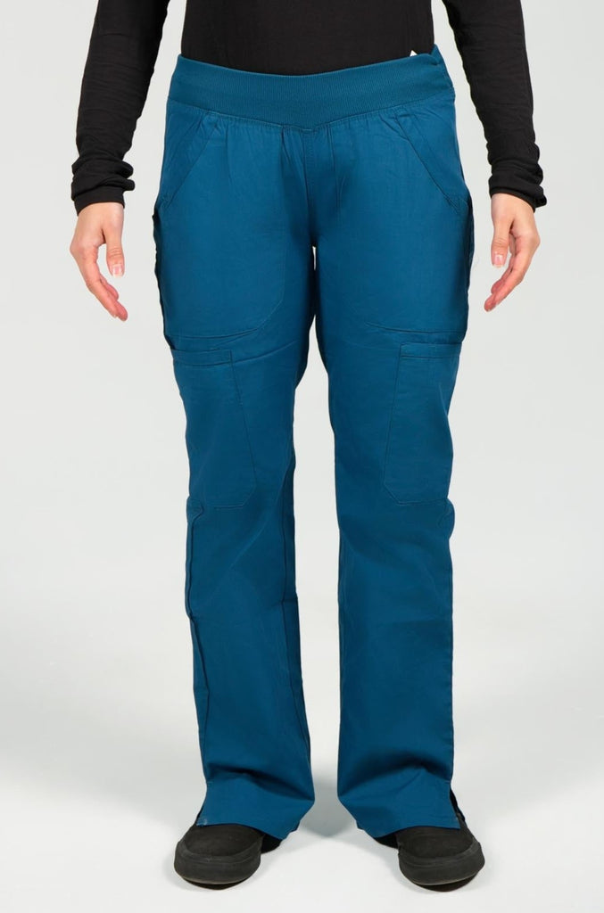 Women's 6-Pocket Elastic Scrub Pant in Caribbean front view on model