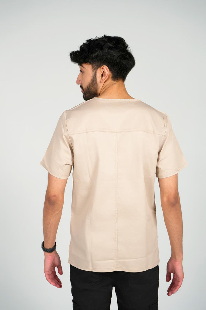 Men's 4-Pocket Scrub Top in beige on model back view