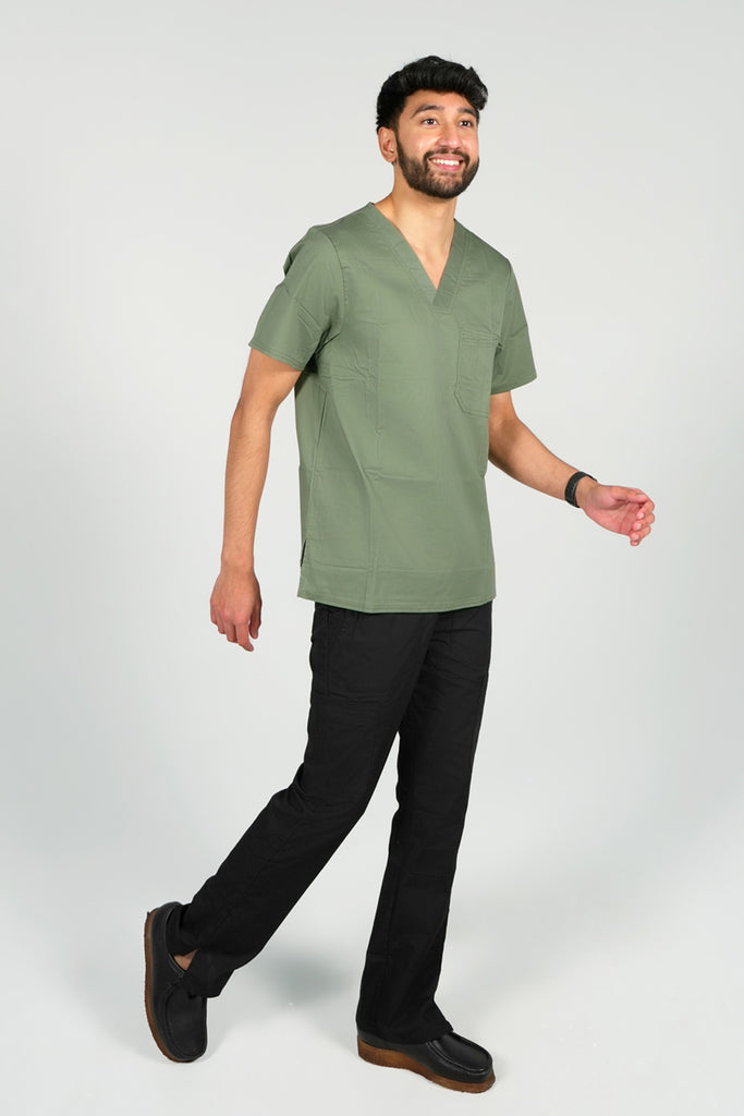 Men’s 2-Pocket V-Neck Scrub Top in Olive side view on model wearing black scrub pants