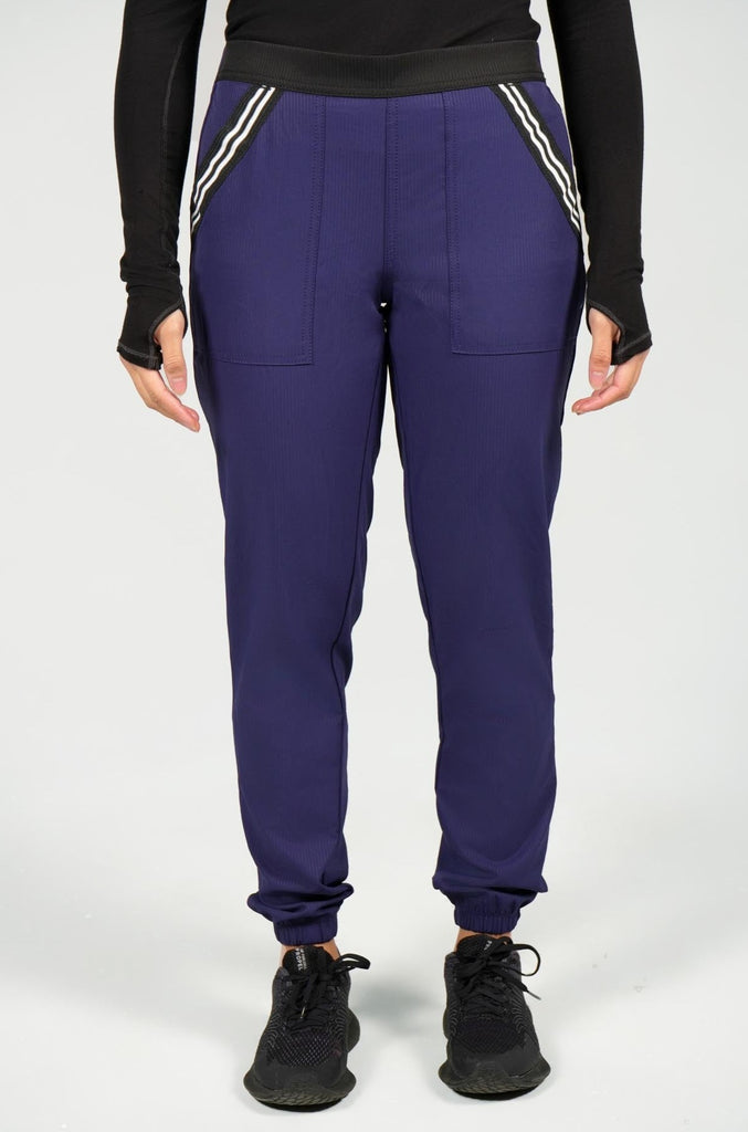 Women's Active Striped Scrub Jogger in navy front view on model
