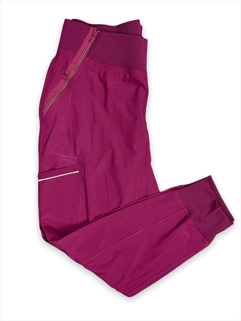 Men's Performance Scrub Jogger in shade wine folded view, showing elastic waistband, zip, pocket and ankle cuff