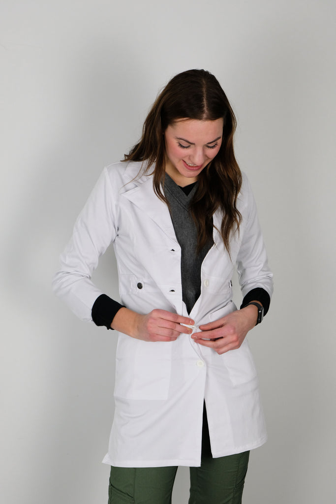 White Lab Coat Mid Length model buttoning up lab coat