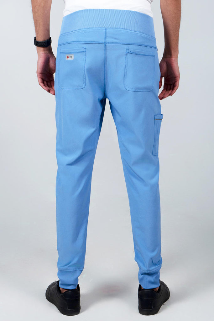 Men's Performance Scrub Jogger in shade periwinkle view from behind