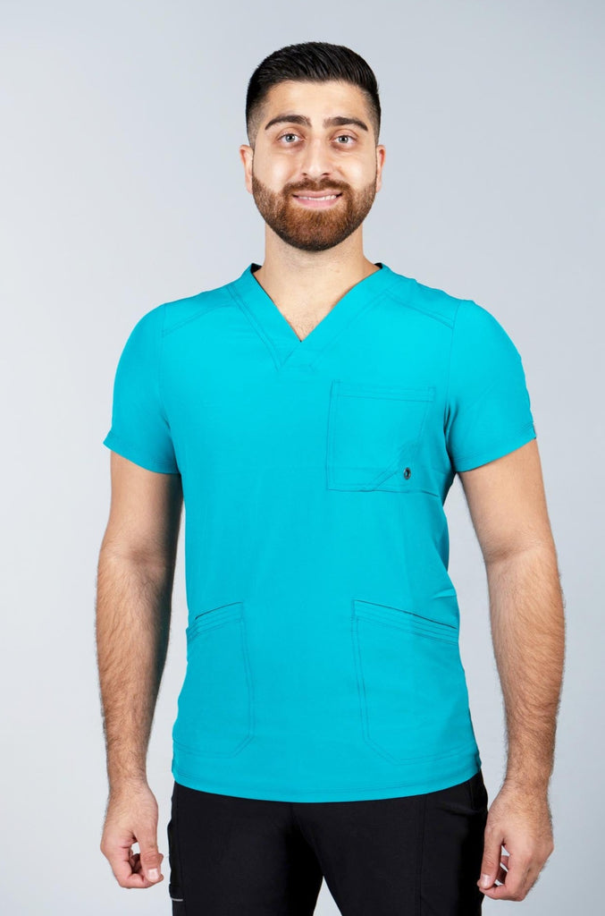 Men's Performance Scrub Top in Teal front view on model