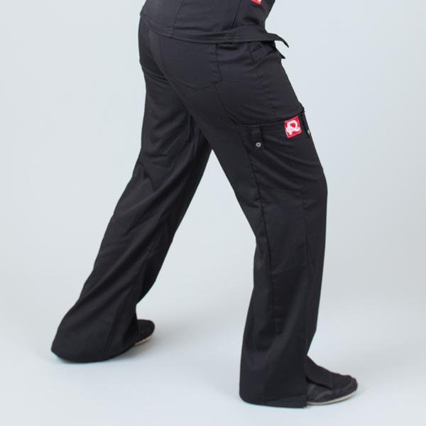 Women’s premium Flex Scrub Pants in shade black shown from side showing flex and stretch of fabric