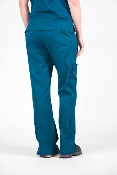 Women’s premium Flex Scrub Pants in shade caribbean shown from behind paired with matching caribbean flex scrub top.