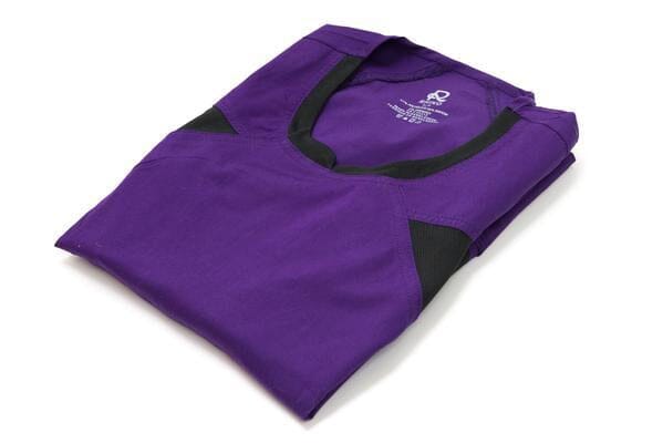 Women's Ultra Flex 4-pocket Scrub Top in eggplant folded side view