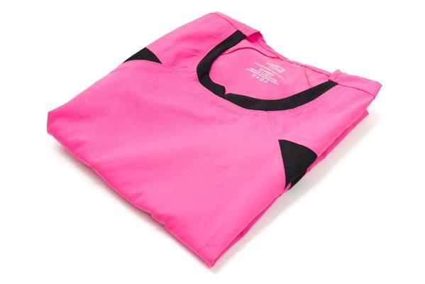 Women's Ultra Flex 4-pocket Scrub Top in pink folded side view