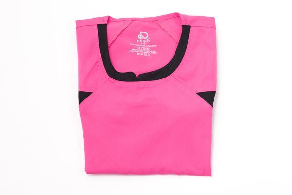 Women's Ultra Flex 4-pocket Scrub Top in pink folded front view
