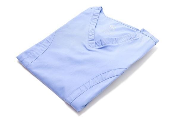 Women’s premium Flex 3-Pocket Scrub Top in shade periwinkle folded sideview