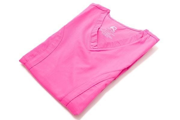Women’s premium Flex 3-Pocket Scrub Top in shade pink folded sideview