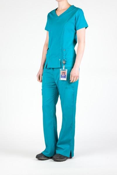 Women’s premium Flex 3-Pocket Scrub Top in shade teal paired with matching scrub set women's Flex Pants in shade teal front view with id badge hanging from utility loop