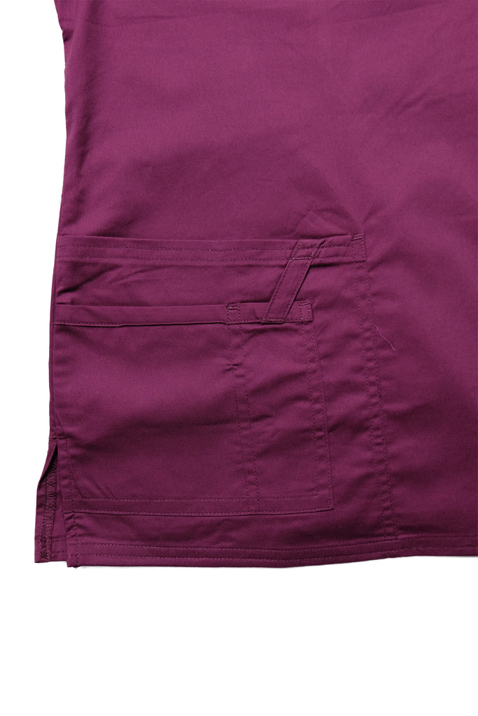 Women's Tailored 4-Pocket V-Neck Scrub Top in Wine closeup on pockets with utility loop